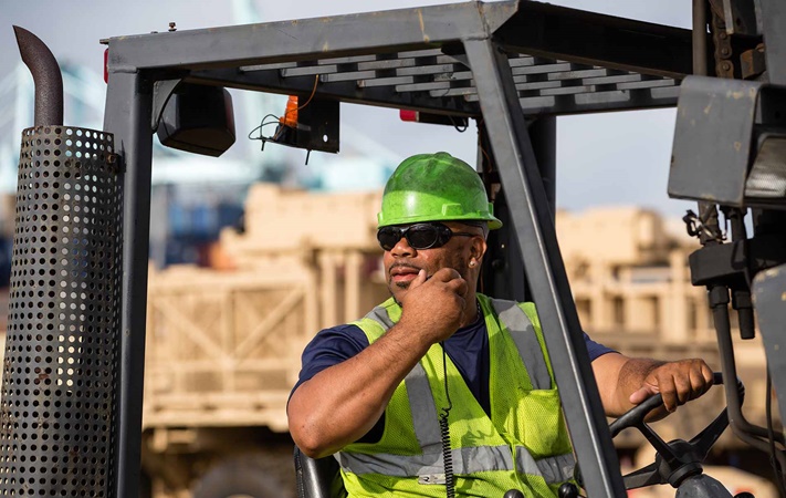 Man driving forklift